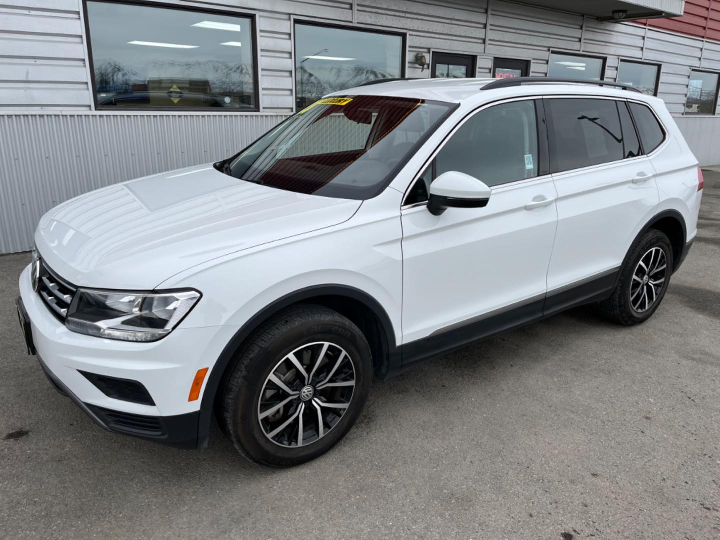 2021 White Volkswagen Tiguan SE 4Motion AWD (3VV2B7AX9MM) with an 2.0L L4 DOHC 16V TURBO engine, 8A transmission, located at 1960 Industrial Drive, Wasilla, 99654, (907) 274-2277, 61.573475, -149.400146 - Photo#0